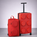 Red LEGO suitcase and backpack on a light gray background