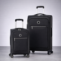 Two black suitcases with visible brand logo on a gray background